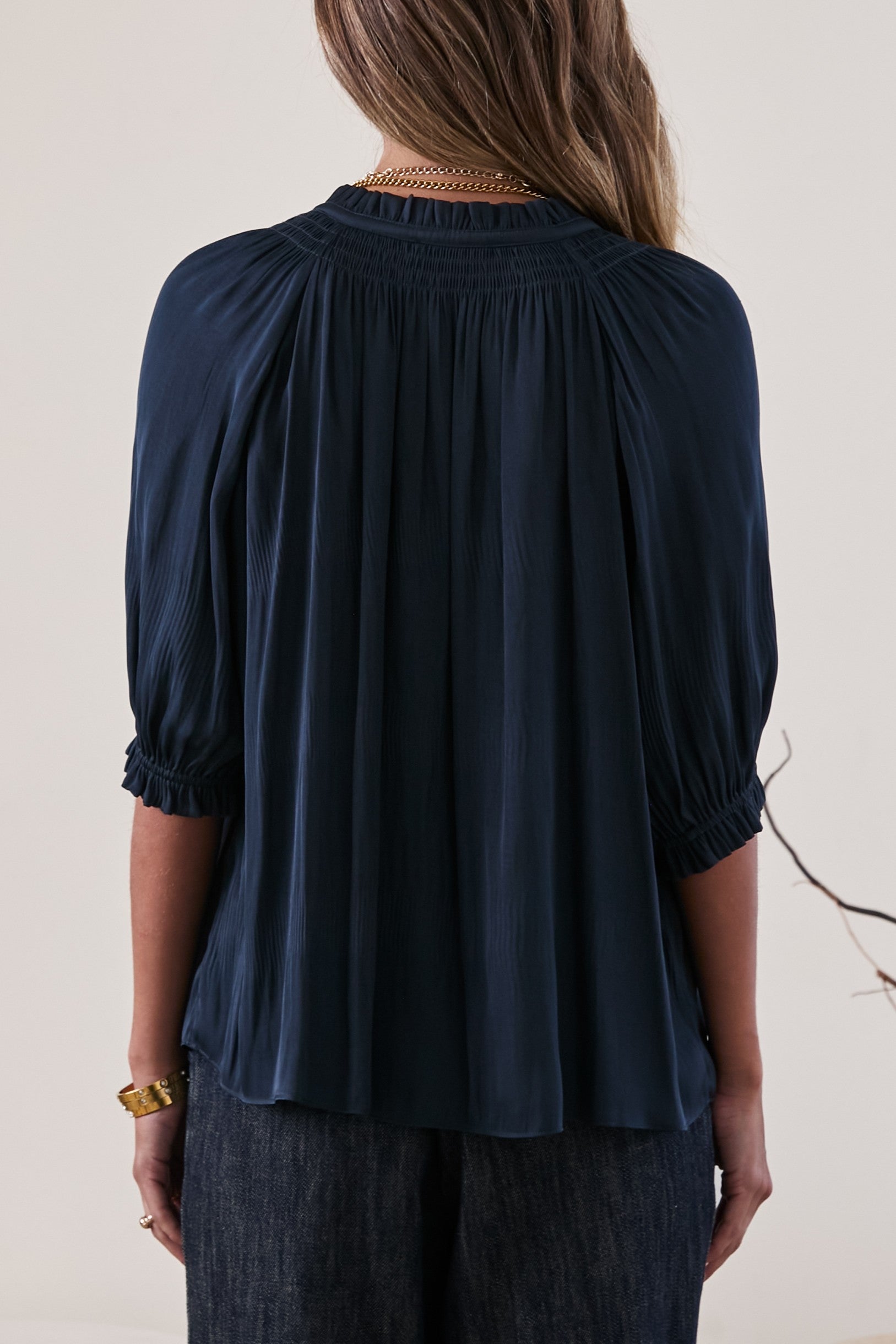 Blue Pleated V-Neck Blouse with Smocked Details