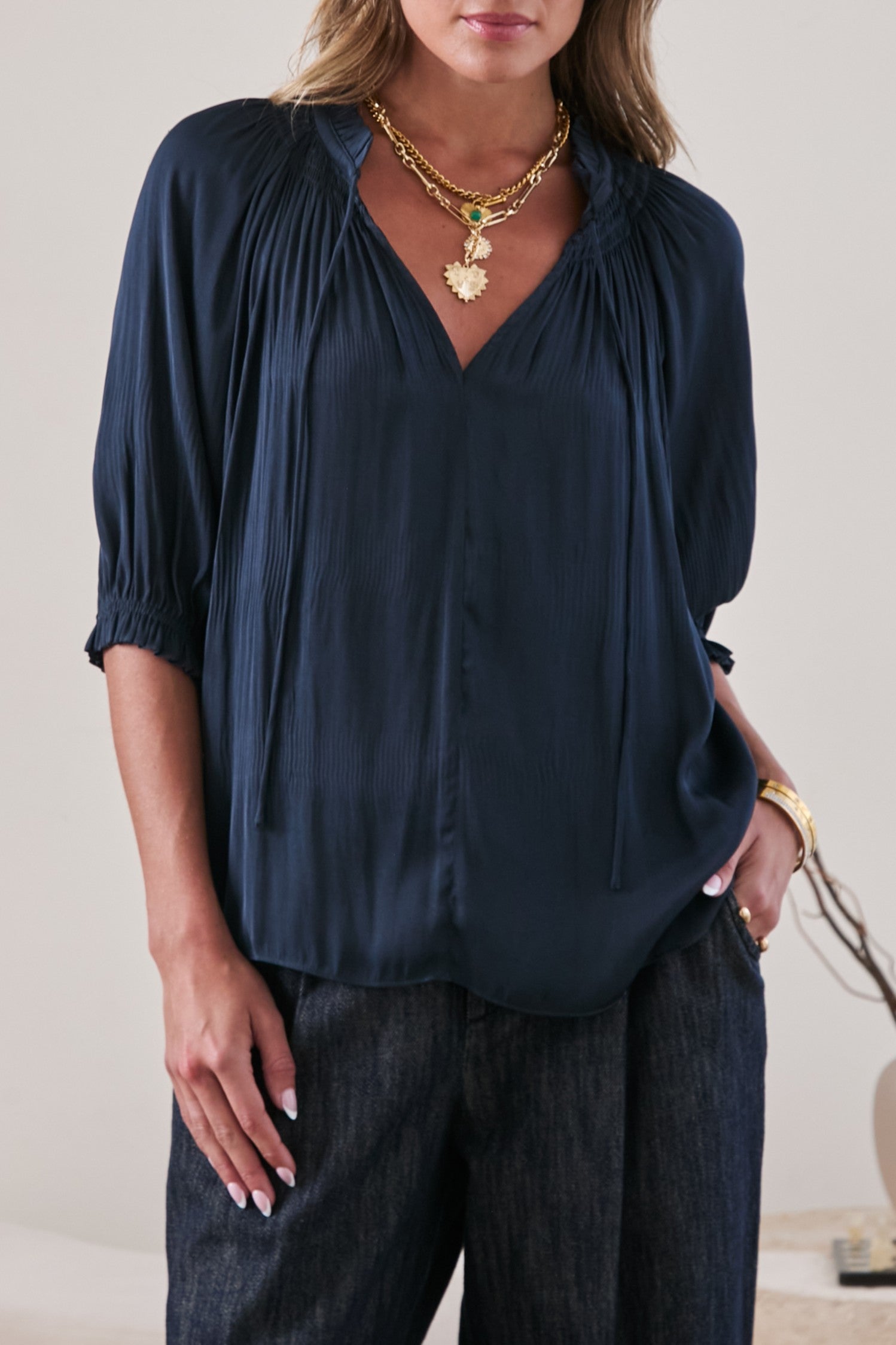 Blue Pleated V-Neck Blouse with Smocked Details