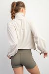 HEAVY POLY STRETCH WOVEN QUARTER ZIP TOP WITH COLLAR NUDE