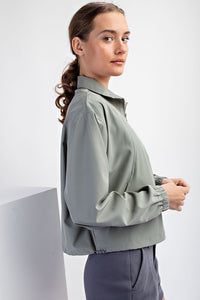 HEAVY POLY STRETCH WOVEN QUARTER ZIP TOP WITH COLLAR GREEN