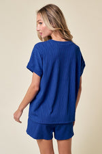 Good timing textured short sleeves top