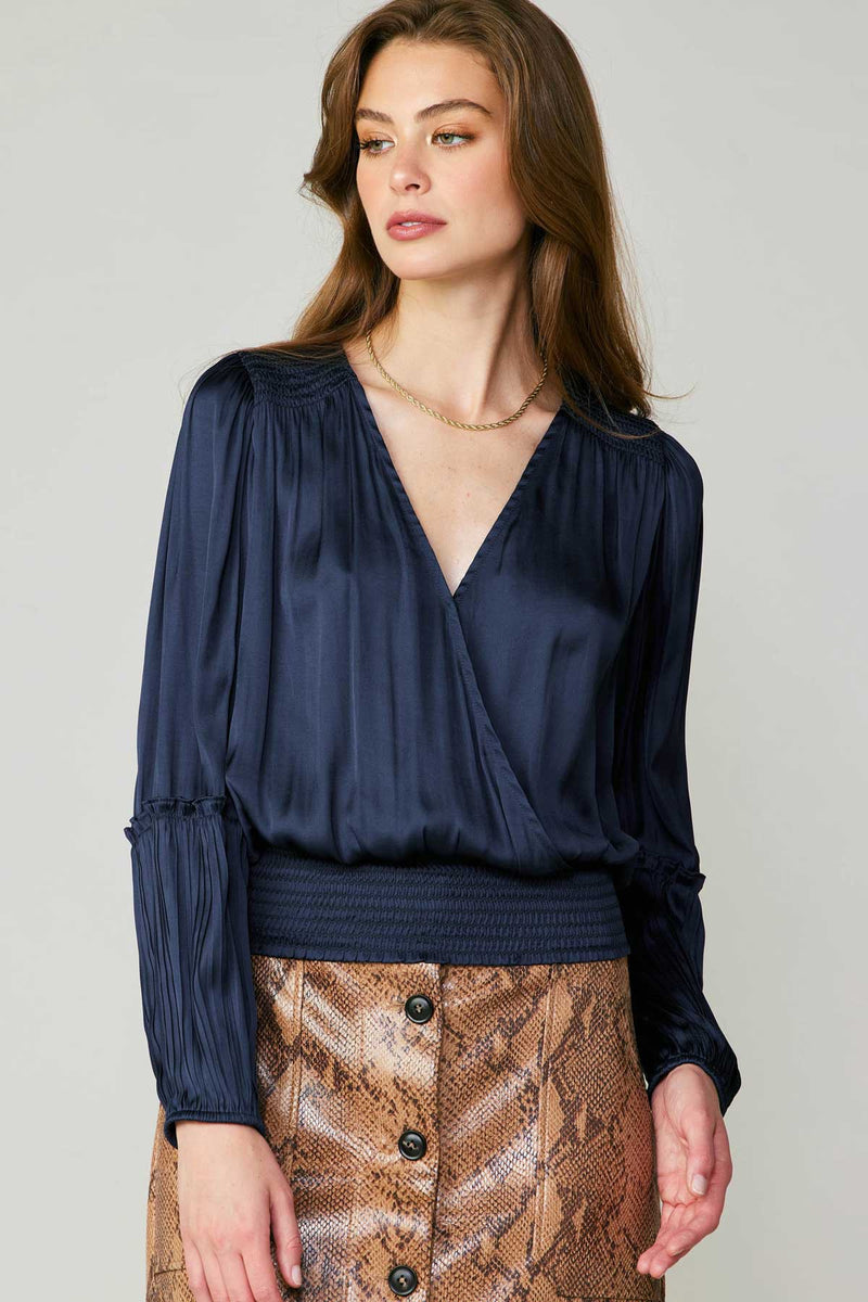 SURPLICE NECK BLOUSE WITH PLEATED DETAIL