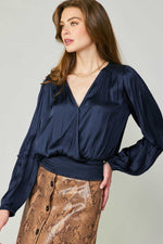 SURPLICE NECK BLOUSE WITH PLEATED DETAIL