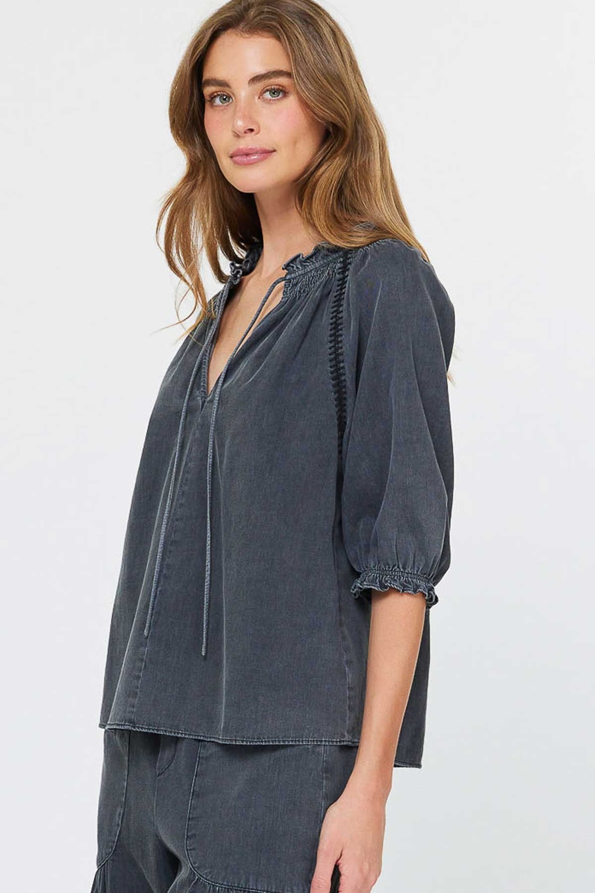 Washed Black Ruffle Tie-Neck Blouse with Shirred Sleeves