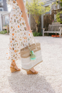 Natural Woven Straw Tote Bag with White Stripe and Tassel Charm