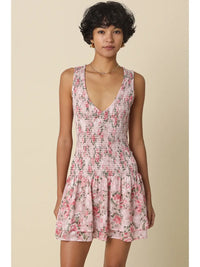 Smocked Floral Mini Dress with Ruffle Hem and Sleeveless V-Neck Design