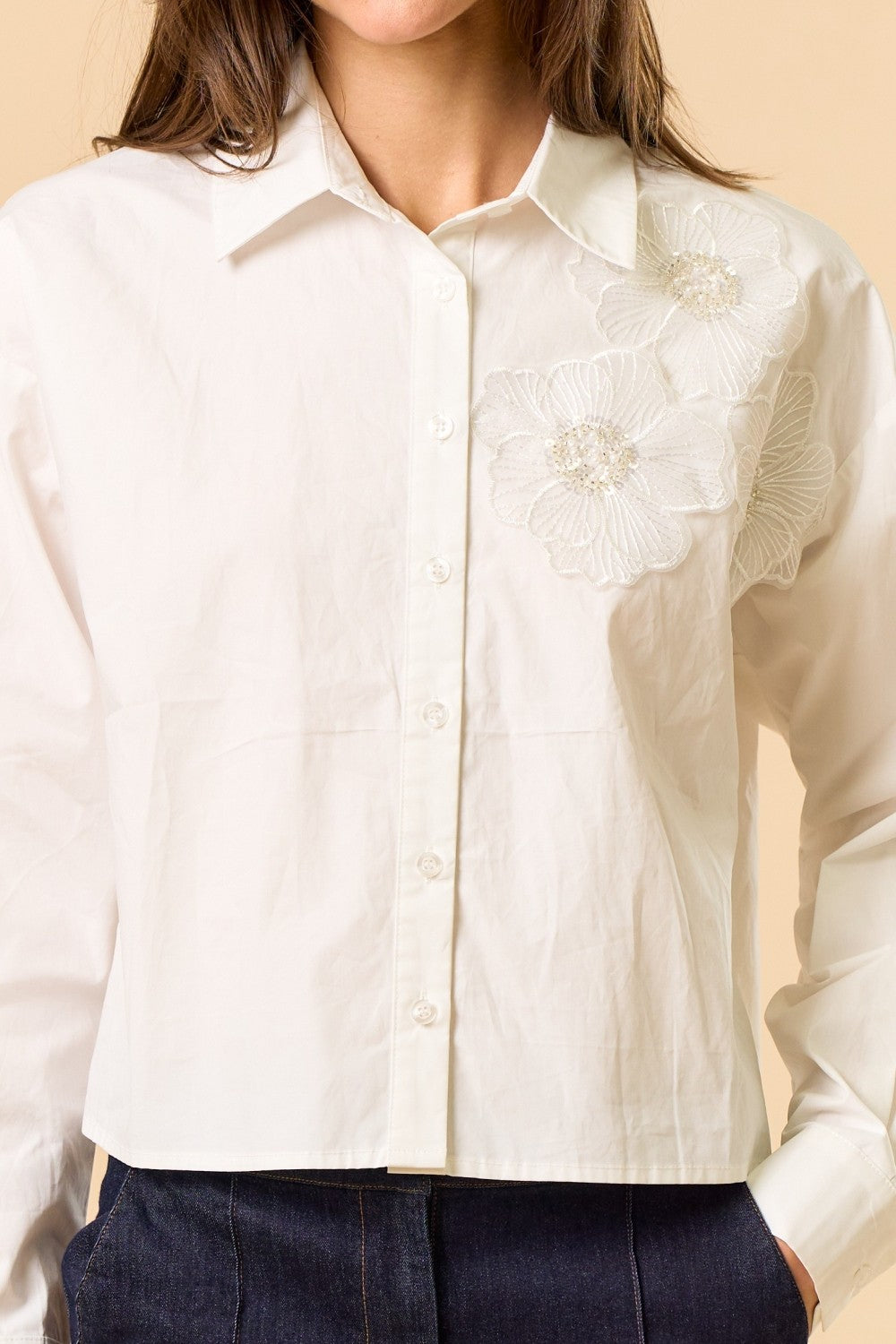 Cropped Button-Up Shirt with Floral Appliqué Detail and Long Sleeves