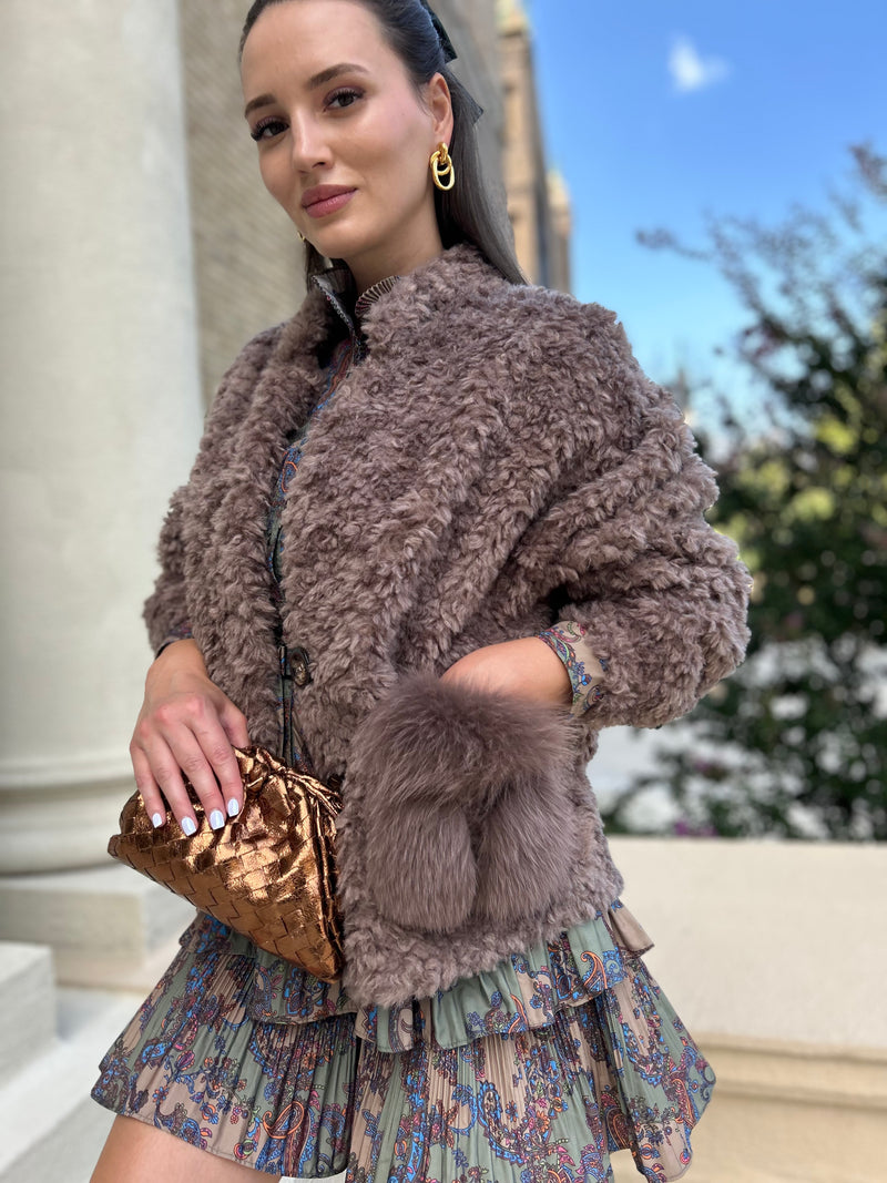 Brown teddy coat with fox fur pockets