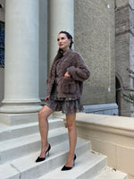 Brown teddy coat with fox fur pockets