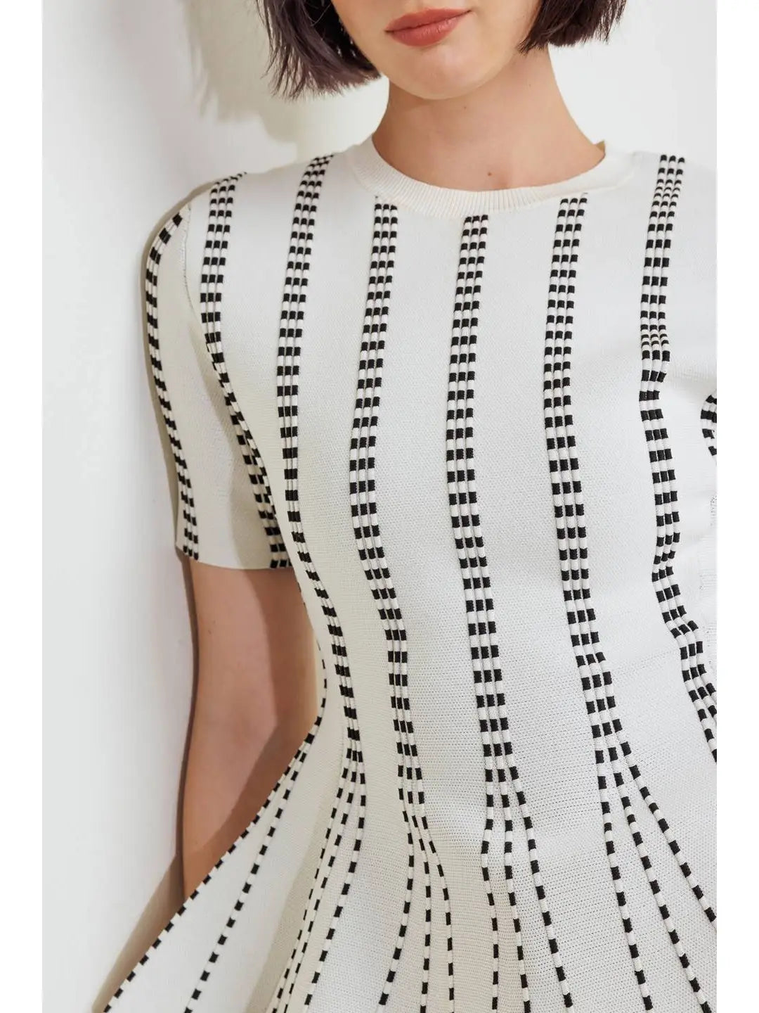 Monochrome Optical Illusion Peplum Knit Top