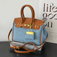 Two-Tone Structured Satchel with Gold Lock Charm and Crossbody Strap