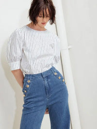 High-Waisted Flare Denim Jeans with Gold Button Detail