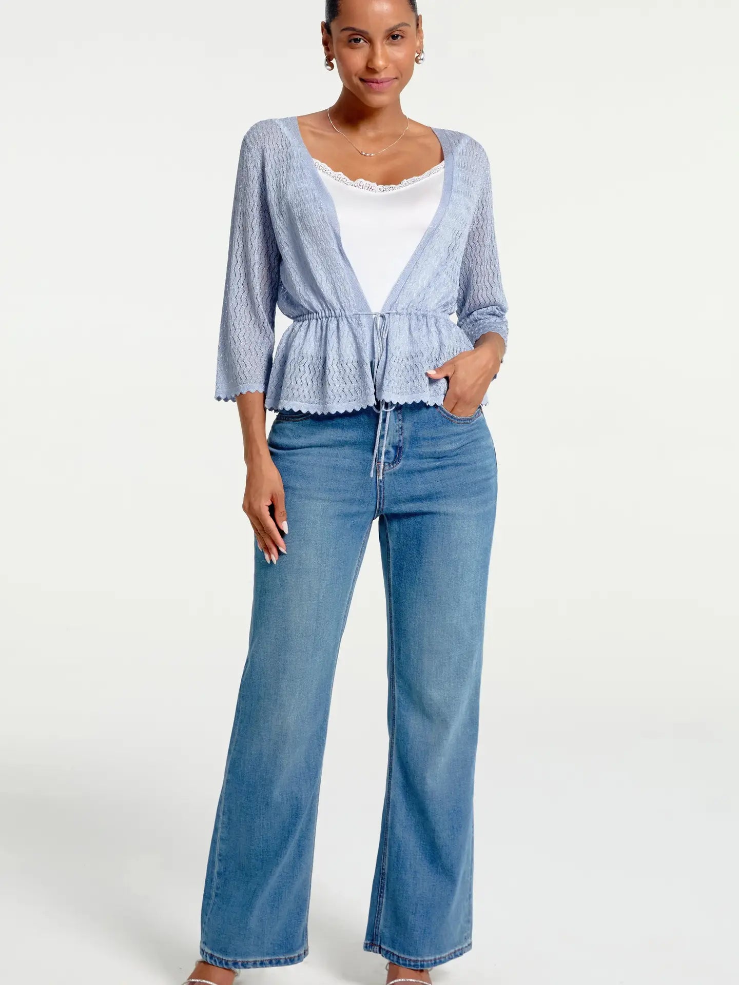 Light Blue Textured Knit Peplum Top with Tie Front