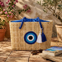 Evil Eye Straw Tote Bag with Drawstring Lining and Tassel Detail